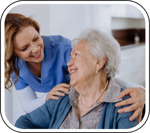 Nurse caring for elderly woman