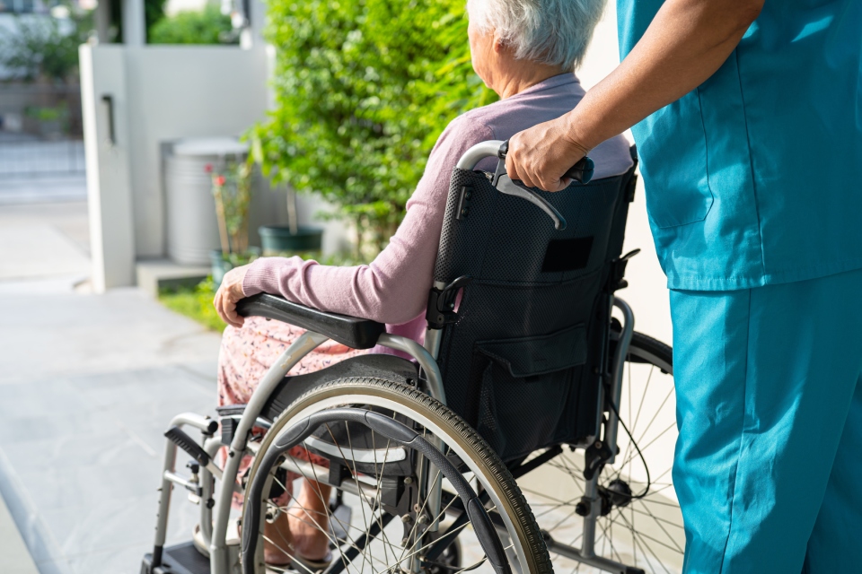 Nurse taking care of handicapped person